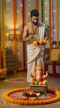 Man worshipping a statue on the floor