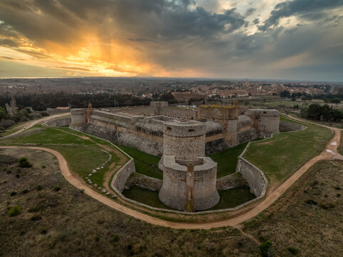Aerial view of transitional fortress of Salses on the French Spanish border with dramatic colorful sky
