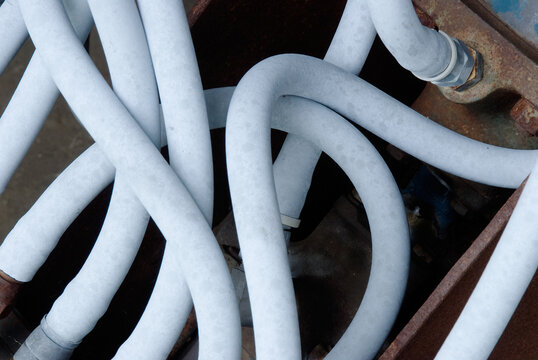 Old PVC pipes at abandoned shake and shingle mill.   Sicamous, BC, Canada