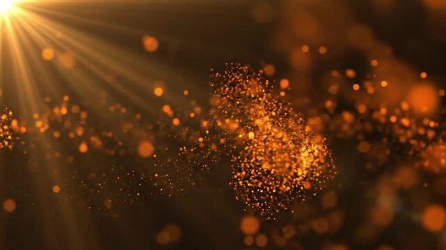 Sparkling orange particles move in a dark space creating a visual effect seen during special events or performances