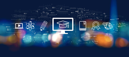 Fototapeta premium E-learning concept with blurred city at night
