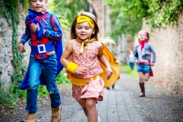 Children playing superheroes outdoors. © Rawpixel.com