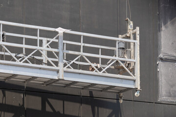 Suspended Platform Cradle Construction Gondola for painting and installation construction or maintenance work outside building.