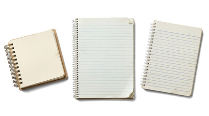 group of three assorted notebooks, including a small unlined notepad and two lined spiral notebooks, isolated on a transparent background. © Christine