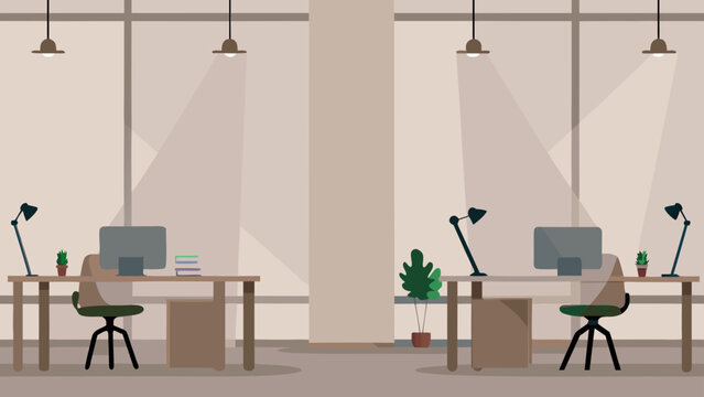 Modern office workspace with computers and plants on desks