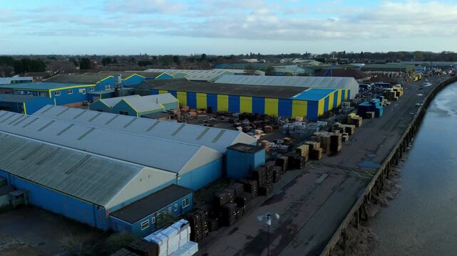 Aerial drone sequence provides a high-definition overview of the Port of Wisbech and its associated industrial wharf facilities on the River Nene, Cambridgeshire.