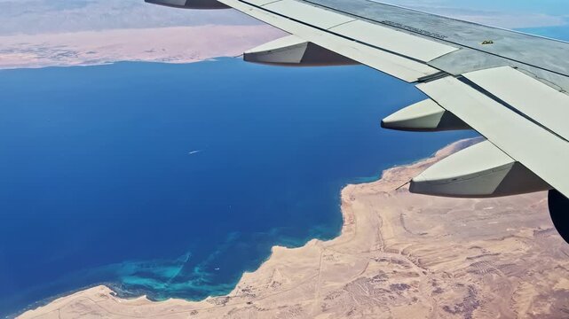 Aerial view from plane of Egypt coast, blue sea near Sharm El Sheikh