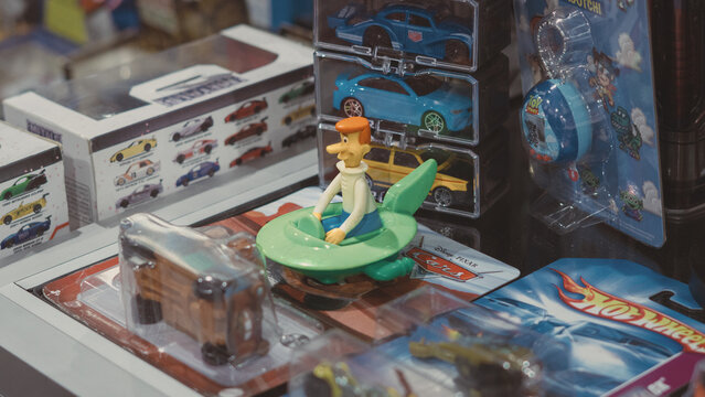 GUAYAQUIL, ECUADOR &ndash; AUG 06, 2023: George Jetson toy figure from The Jetsons displayed among collectible toy cars and pop culture merchandise at a Comic Con collectors event