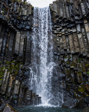 Paradoxical Basalt Waterfall Geometry