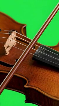Abstract Sound Creation with musician plays the violin green screen distortion, overlay, glitch, static noise, scan lines on black background, 4k animated video loop