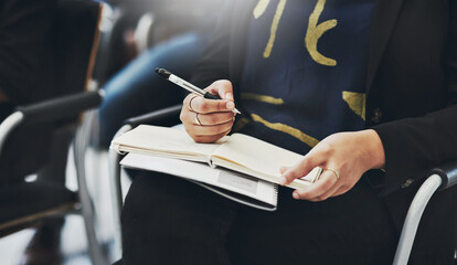 Business, hands and person with notebook in seminar for finance expo, learning info or upskill. Audience, employee and notes at global convention for wealth management, training or career development © peopleimages.com