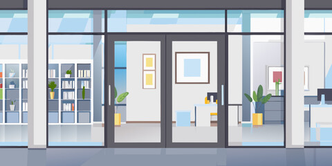 Modern office interior view through glass doors and lobby space © Ankan