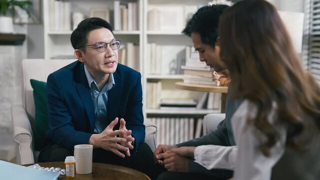 couples therapy session, a marriage counselor consults with a young couple for family therapy, offering relationship counseling, marriage help, family support, anxiety therapy, depression support	
