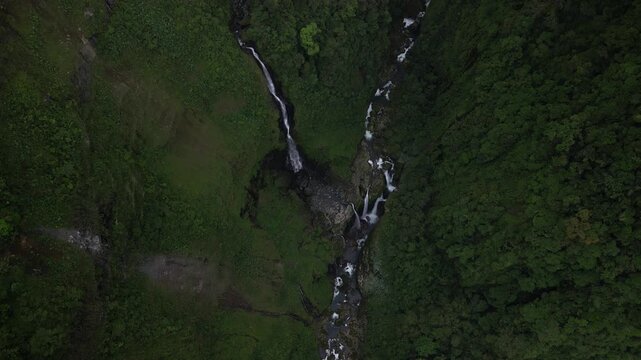 Aerial view of hidden waterfalls Quebrada Gata on river Rio Toro in Costa Rica in lush highlands near Bajos del Toro