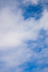 Fototapeta premium Blue sky with clouds background.