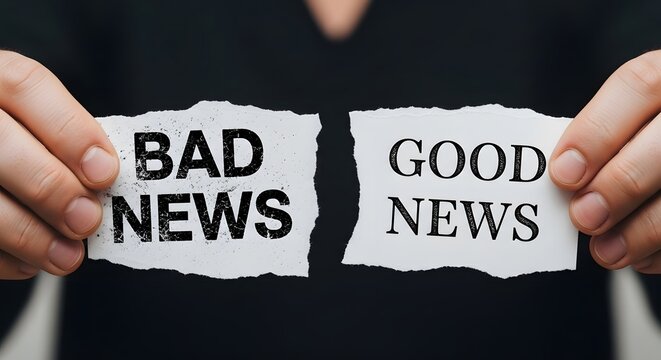 Hands Presenting Good News and Bad News on Torn Paper.