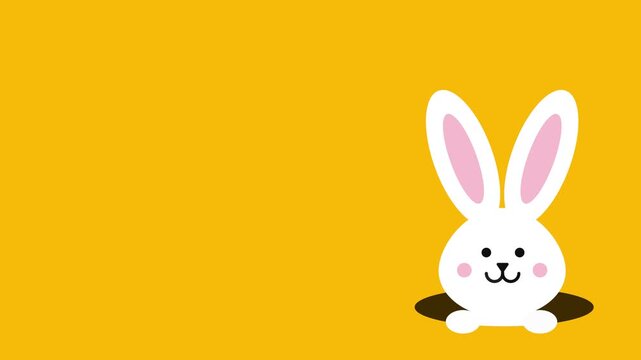 Cute white Easter bunny peeking out of a hole on yellow background with copy space. Happy Easter concept.