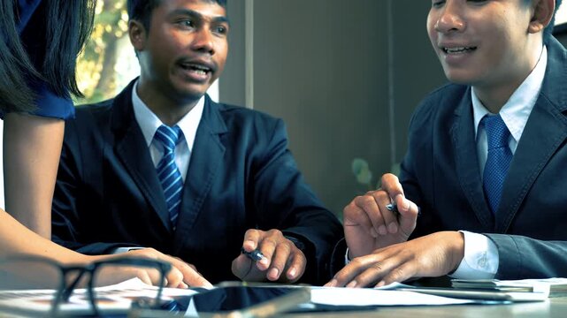 Businessmen discuss and explain their business plans to business partners to persuade them for invest together. 4K