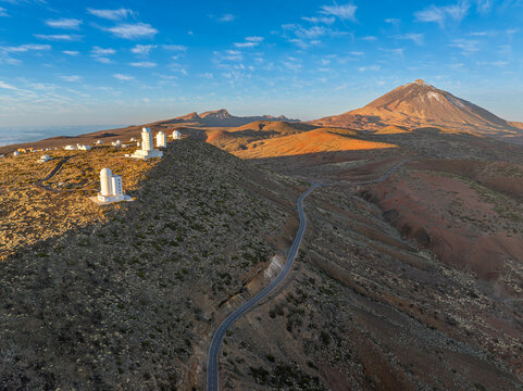 The TF-24 road leads past the Teide Observatory to the Teide volcano. Aerial photo.
