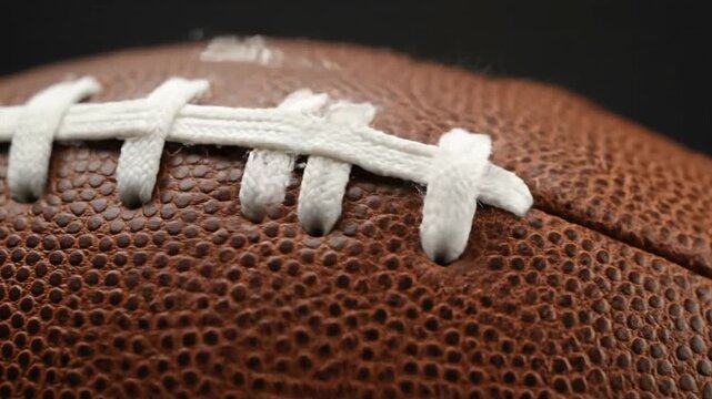 Closeup of American Football Laces and Leather.