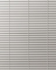 Obraz premium Clean white horizontal blinds create a textured background with subtle shadows and light