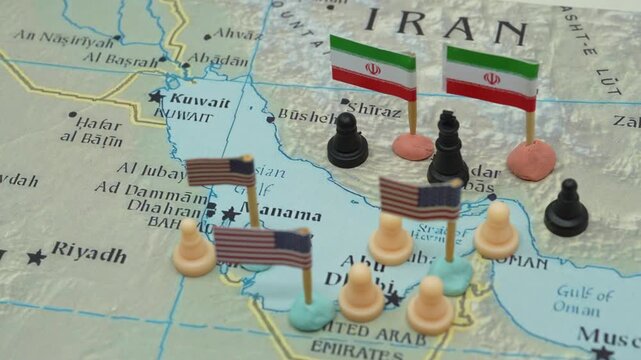 Conceptual representation of the geopolitical conflict between Iran and the USA in the Strait of Hormuz, with chess pieces and national flags symbolizing military strategy over oil control