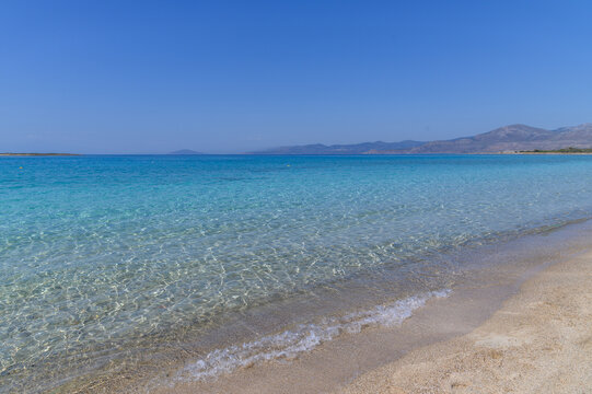 Sunlit Shallows and Sand Ripples at Panagia Beach, Elafonisos, Greece