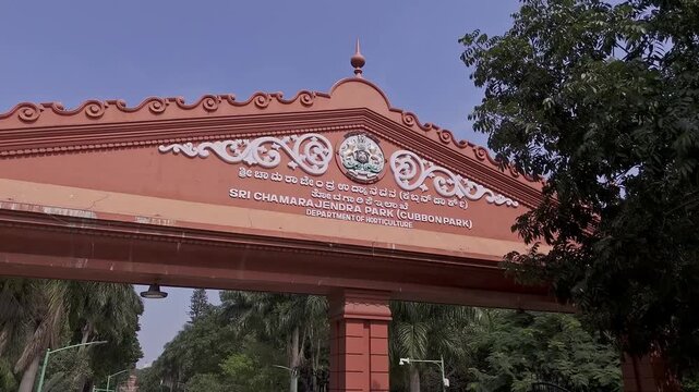 A drone shot capturing the entrance arch of Cubbon Park or Sri Chamarajendra Park in Bengaluru
