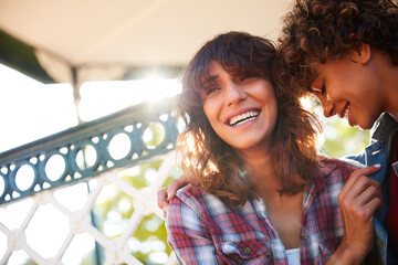 Laugh, love and smile with lesbian couple in park for commitment, bonding and summer holiday....