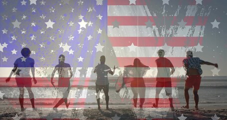 Naklejka premium Walking group in swimwear along wet sand reflecting sun, carrying surfboard beneath flag overlay