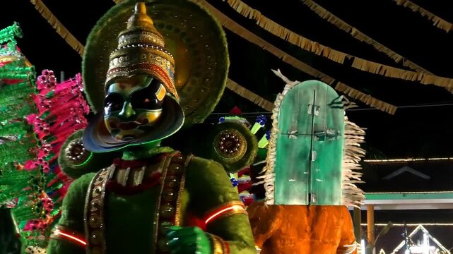 Colorful religious and cultural sculptures displayed in the 'Kavadi' procession of a temple festival in Kerala, India	