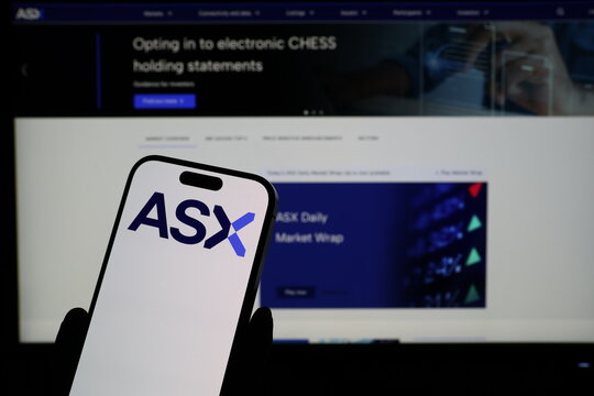 Kiel, Germany - 03-06-2026: Smartphone displaying Australian stock exchange ASX logo in front of companys webpage