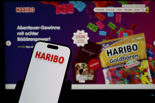 Kiel, Germany - 03-06-2026: Smartphone displaying German confectionery company HARIBO logo in front of companys webpage