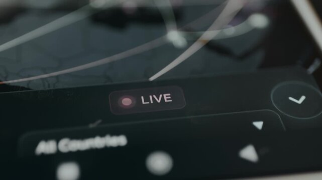 User interface indicating a Live broadcast of cyberattacks happening worldwide on digital map