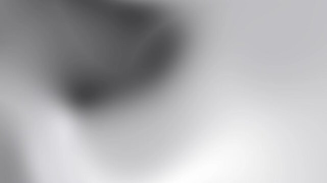 Abstract monochrome grey and white gradient with soft shadows and light reflections.