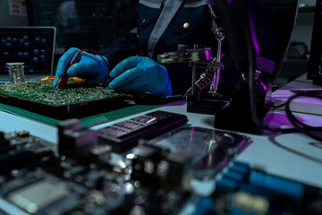 Close up of Technician measuring voltage electronic circuit board, Service after sale fix electric...