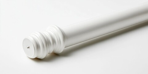 White wooden baluster with decorative fluting on a clean white background