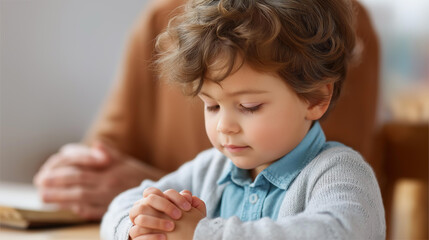 Fototapeta premium Young child learning to pray in church, small hands mimicking folded hands, parent over sacred text guidance, youth prayer instruction, faceless teaching moment, defocused backgrou