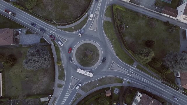 Aerial drone top view of roundabout with cars moving in traffic, transportation and choice concept, 4K.mov