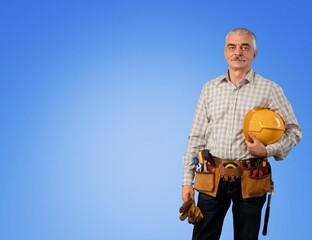 Naklejka premium Worker man wearing hardhat holding tools