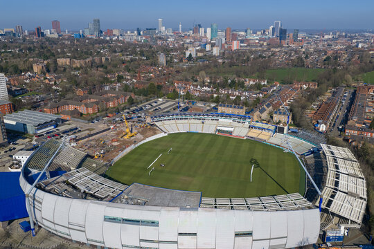 Aerial panorama of Edgbaston Stadium and Birmingham city skyline.