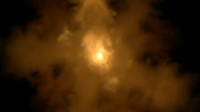 Solar Eclipse with Clouds and Darkness.