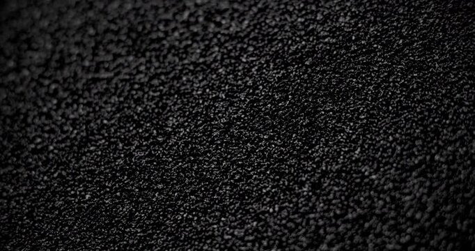 Slow diagonal shift of the background with asphalt texture