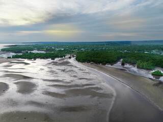 The calm atmosphere of the morning as the sun begins to appear on the eastern horizon of Sumba, near the mouth of the Payeti River, directly facing the Waingapu sea © HeinrichDengi