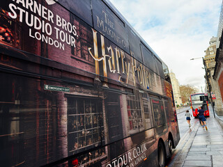 Naklejka premium London street scene with a red double decker bus and Harry Potter studio tour