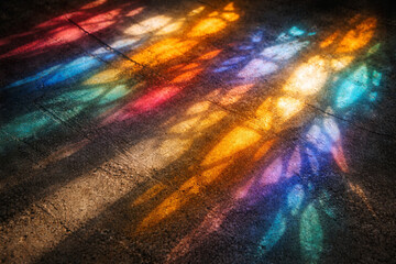 Fototapeta premium Colorful reflections cast on the ground in various hues