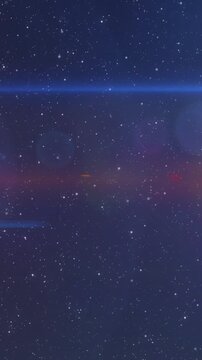 Vertical video: Orange bands arising, sparking flare moving left across stars, making lens halo