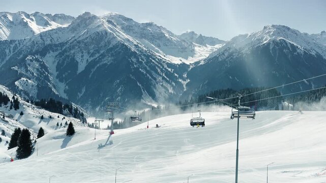 Snowmaking machine at mountain ski resort.