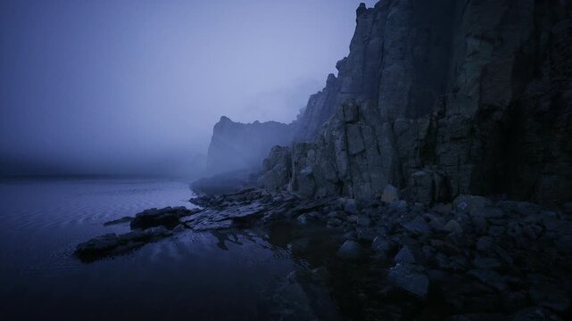 Cliffside ocean scene. Rugged coast with pools. Shoreline marked by cliffs and rocks. Steep cliffs border rocky pools and misted distant ocean