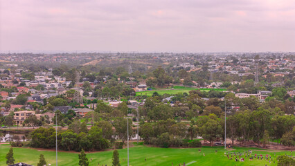 Obraz premium Panoramic Aerial Drone view of Inner Suburbs of Melbourne housing, roof tops, the streets and the parks, the roads and trees of Ascot Vale Moonee Ponds Brunswick Essendon and Maribyrnong in VIC Victor